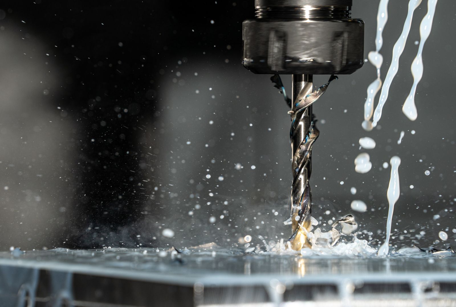 Precision CNC machining of a tool-steel mold component with coolant spray