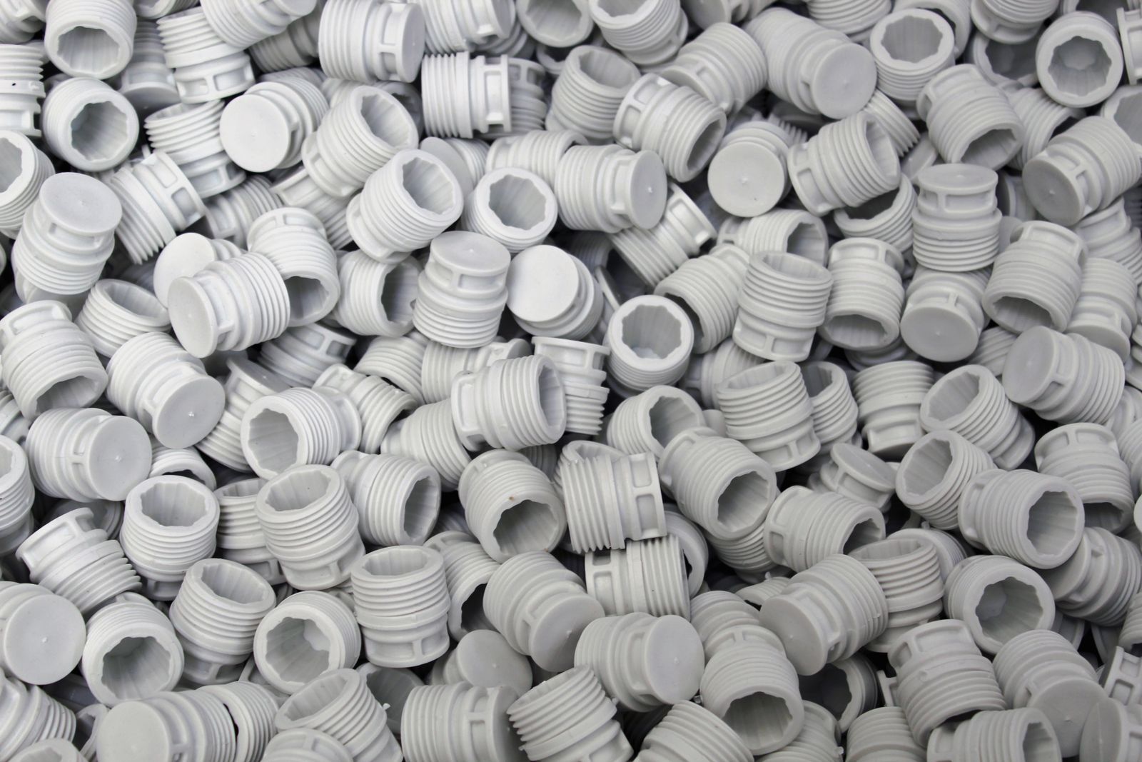 A batch of finished molded plastic components